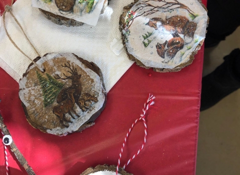 Wooden Christmas ornaments on a table