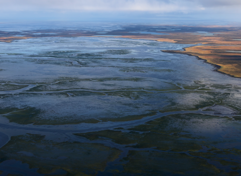 Aerial of large lagoon and shoreline