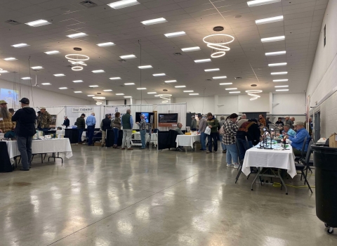 Exhibitors set up in conference room